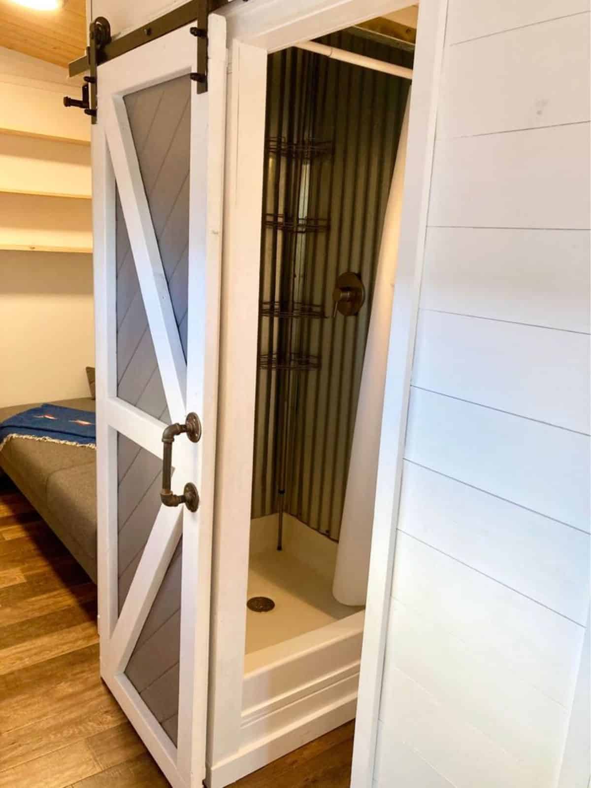 Separate shower area in bathroom of 25' Beautiful Tiny Home