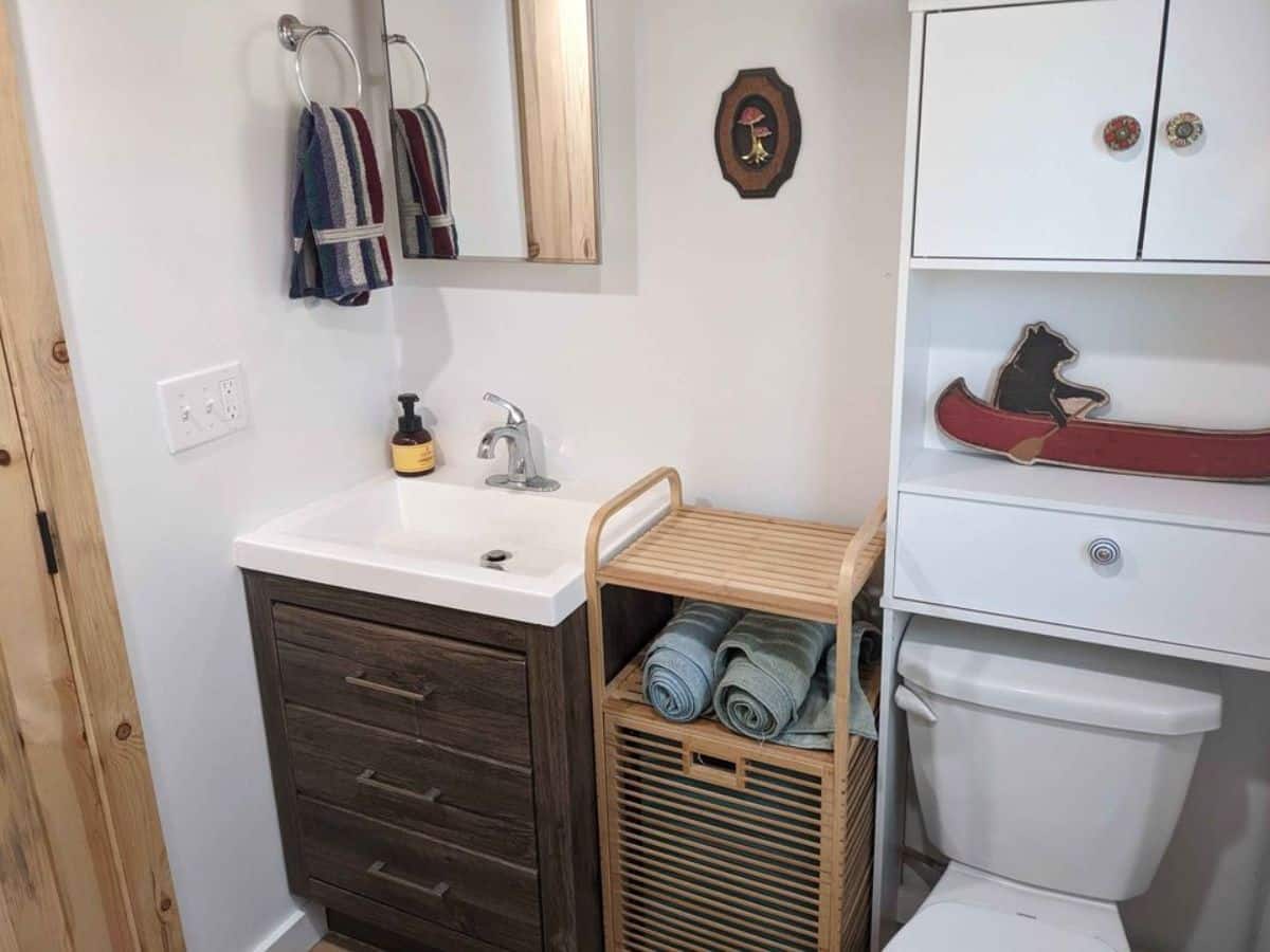 Sink with vanity & mirror and storage rack