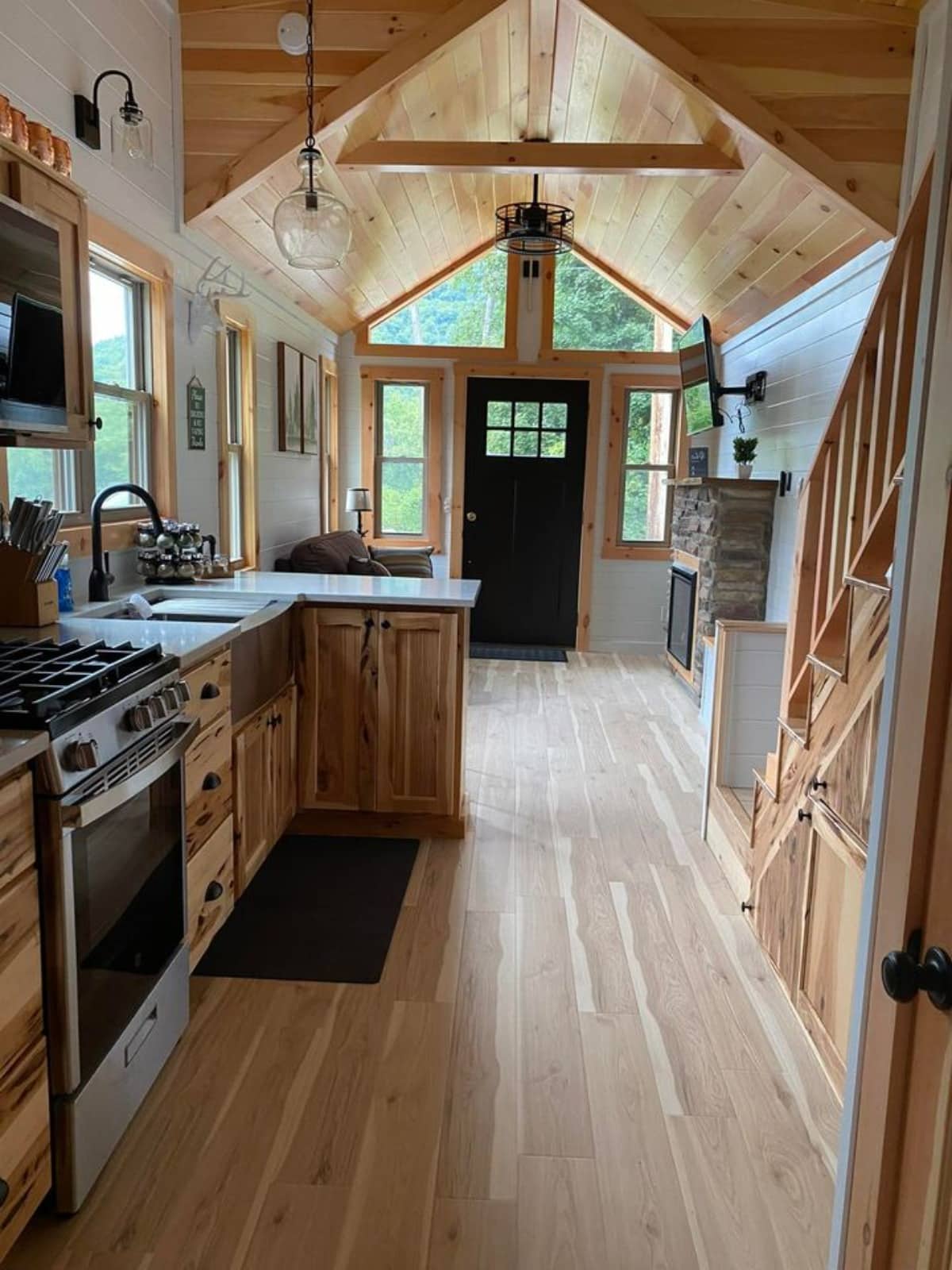 Stunning wooden interiors of 30' Custom Hickory Lodge is the Tiny Cabin