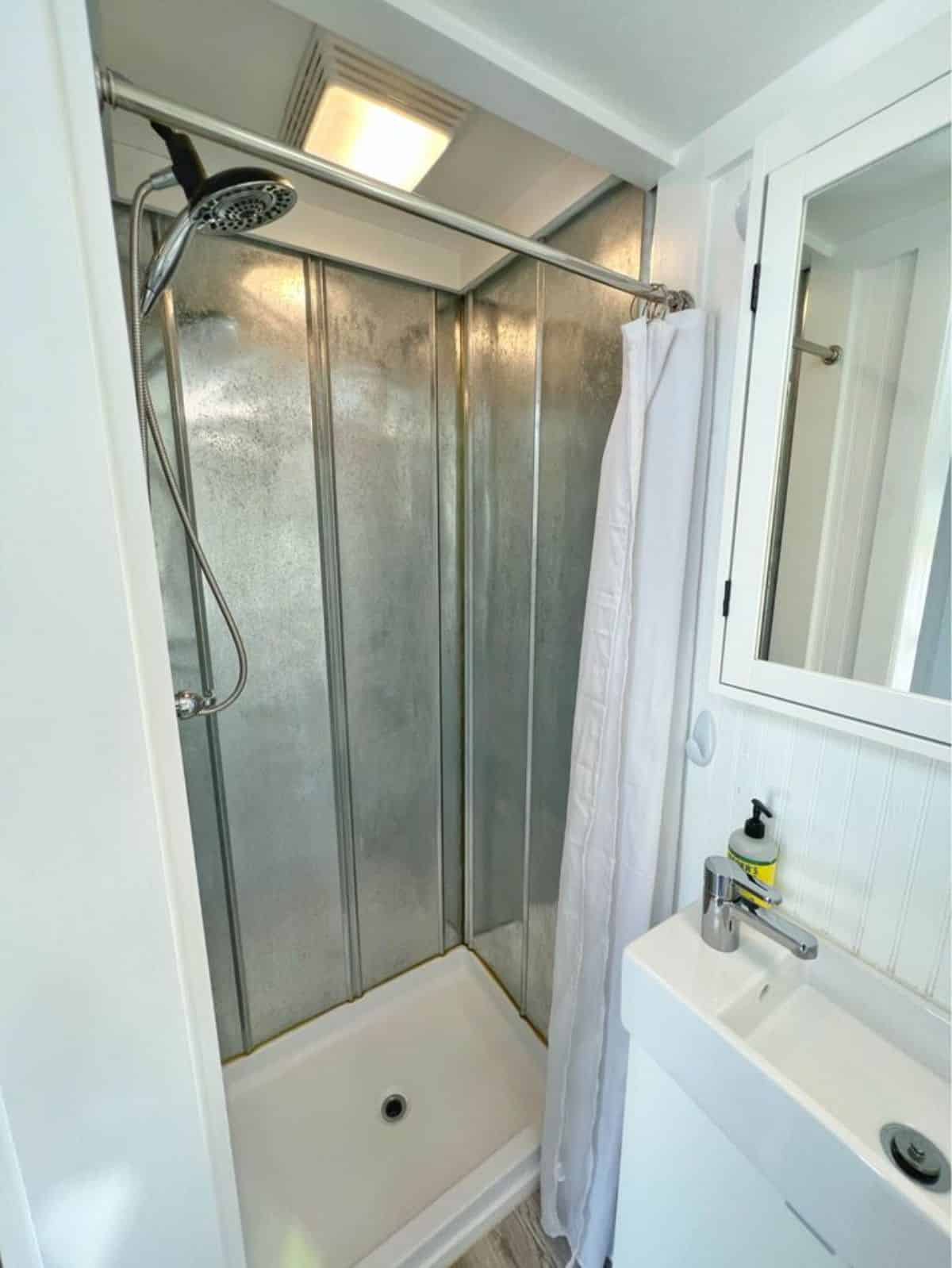Seperate shower area in bathroom