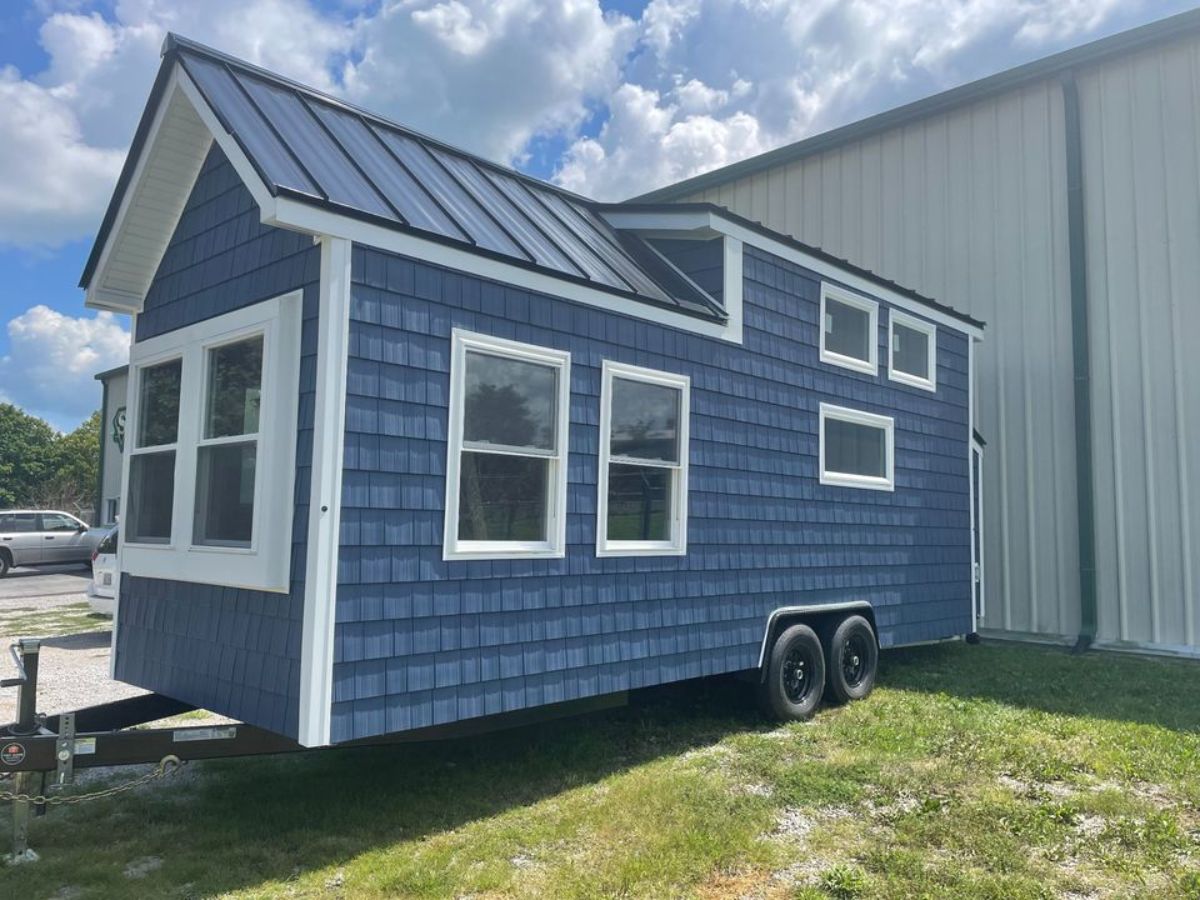 Classic blue and white exterior of 326 sf Spacious Tiny House