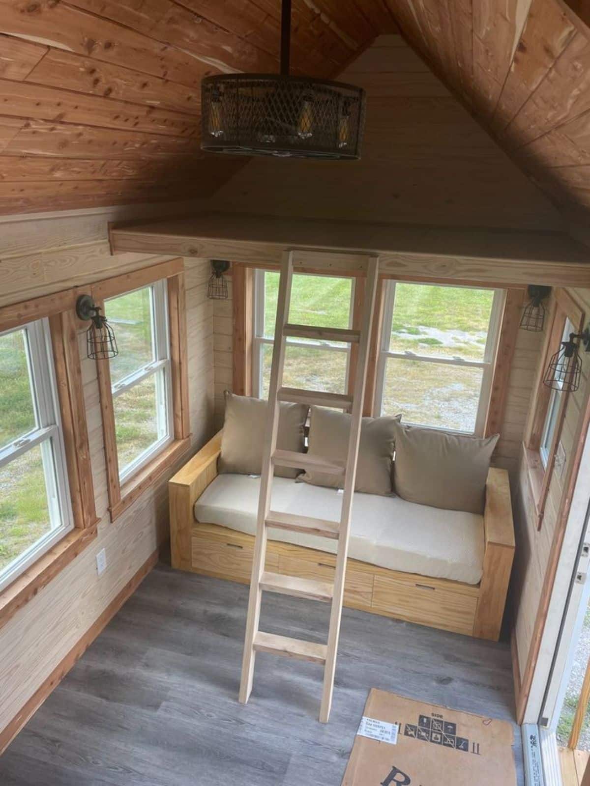 Ladder leading to the other loft space of 326 sf Spacious Tiny House