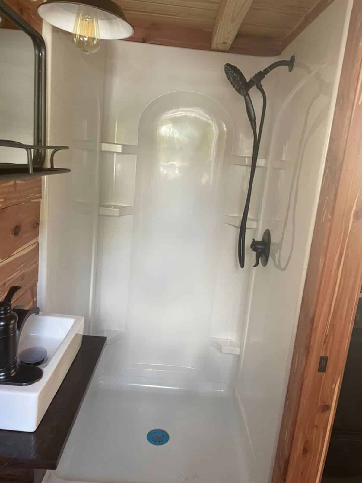 Separate shower area in bathroom of 326 sf Spacious Tiny House