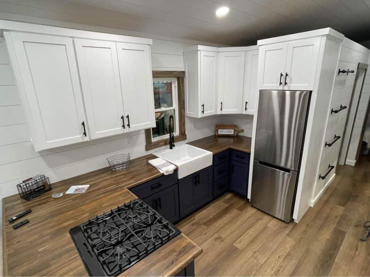 Well organized kitchen area of 34’ Bumper Pull Tiny Home