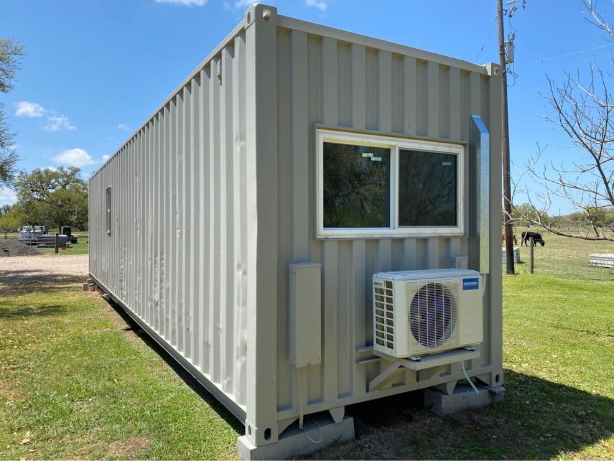 Air condition unit installed in bedroom of 40’ Shipping Container Tiny Home