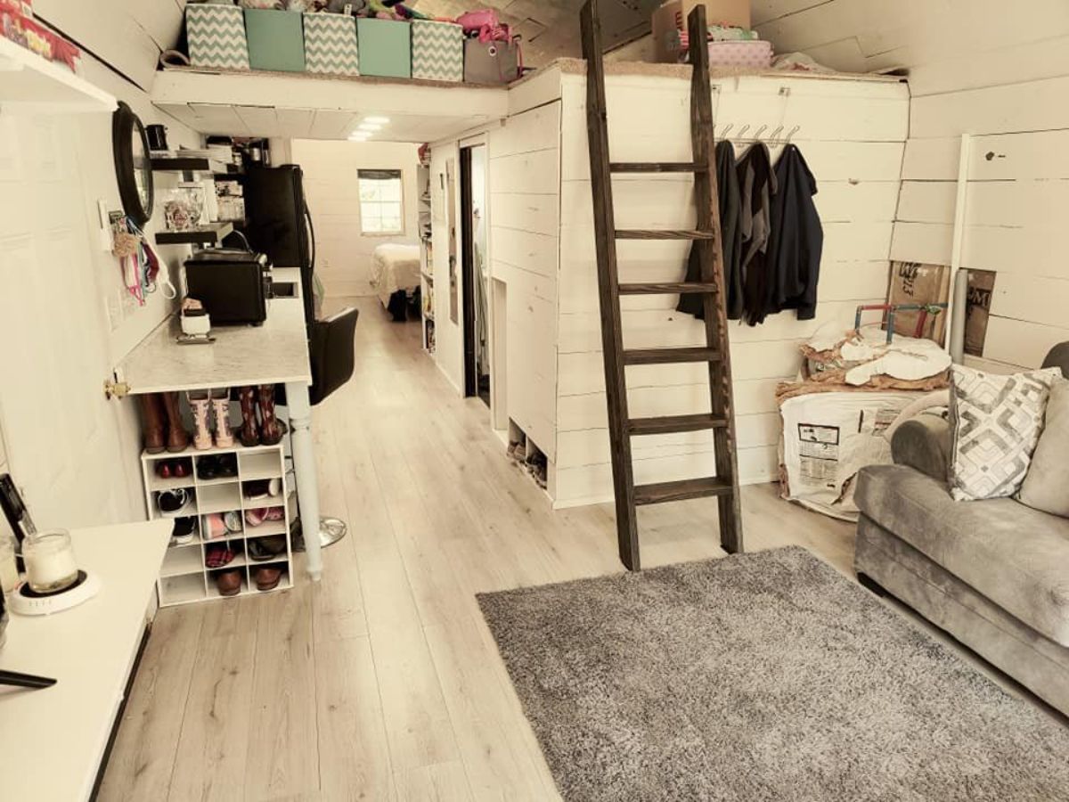 Loft space is accessible through the ladder which can be used for storage