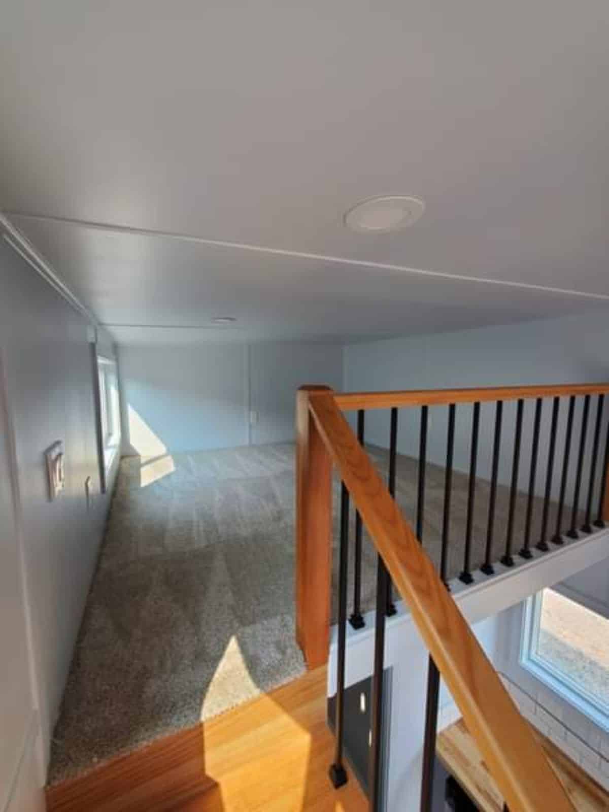 Loft bedroom of Brand-New Tiny Home