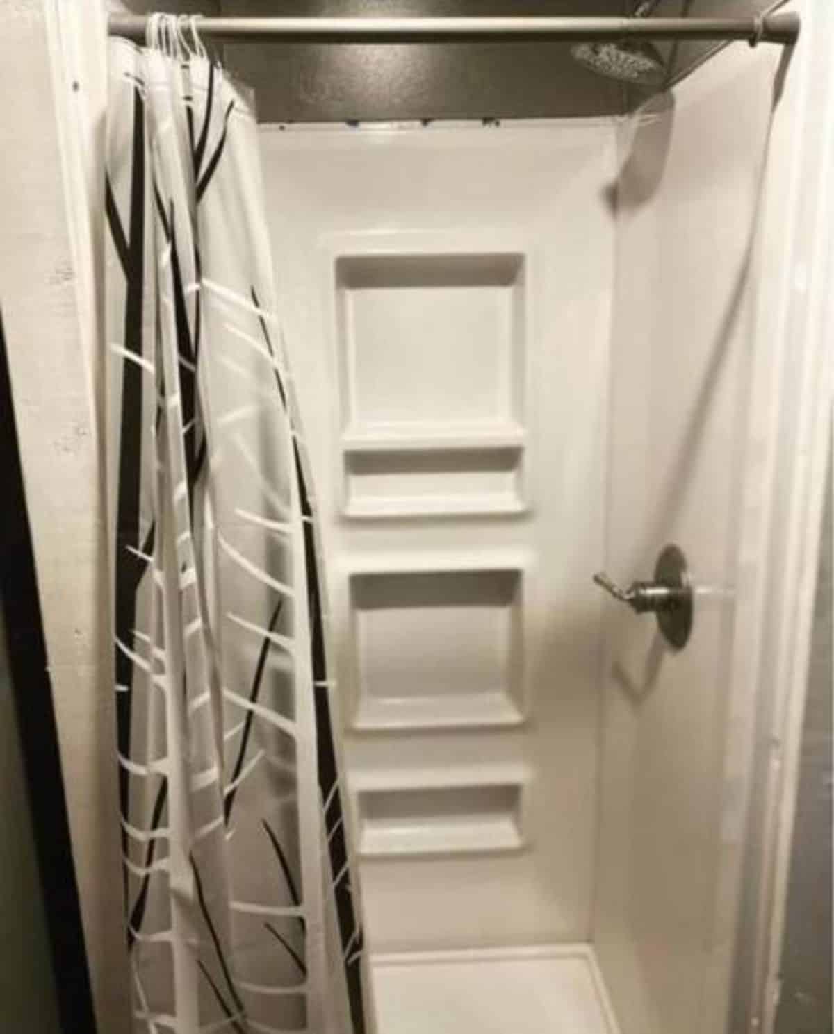 Separate shower area in bathroom of Stunning 32' Tiny Home