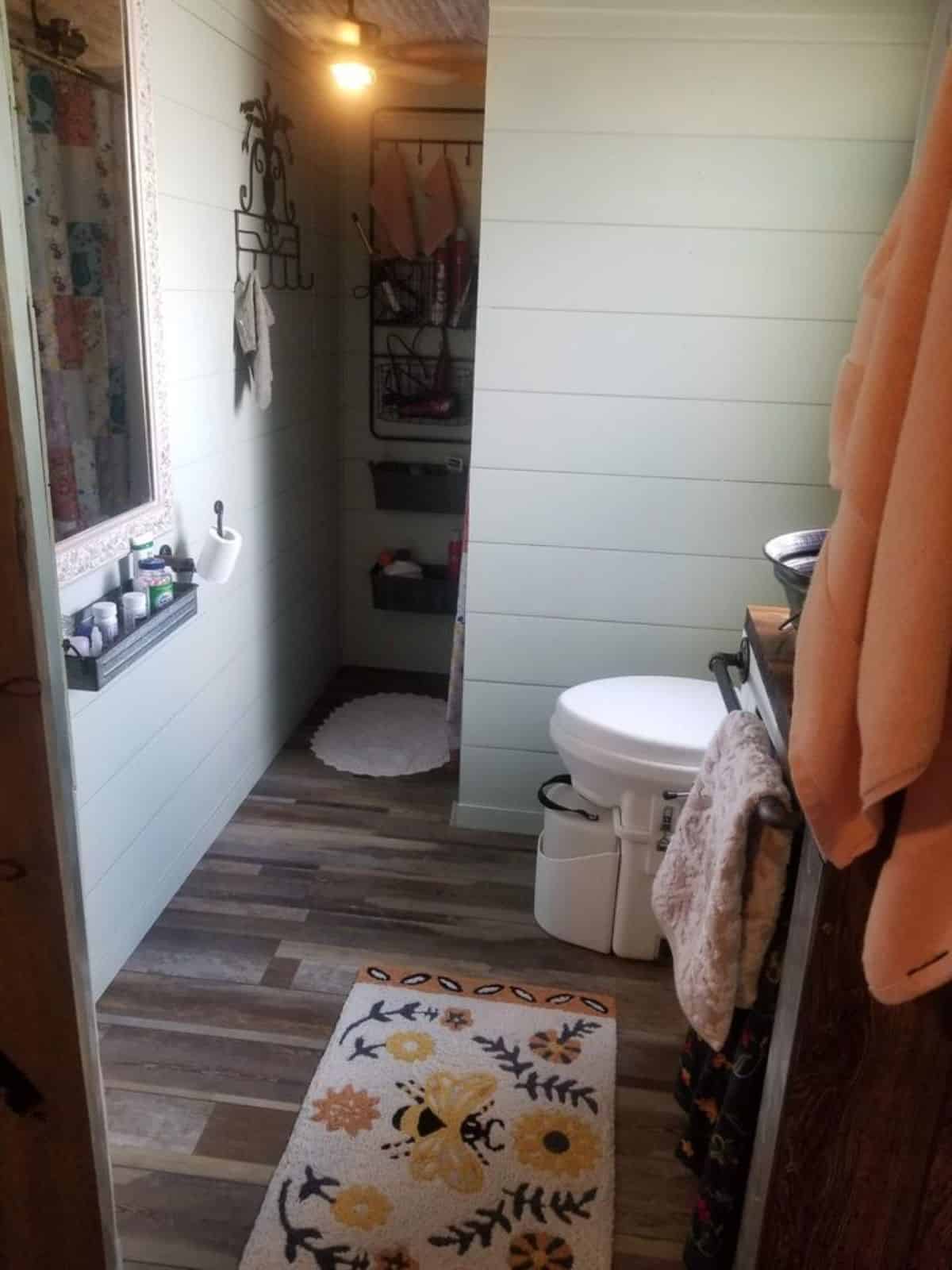 Mirror and other place to shower in bathroom