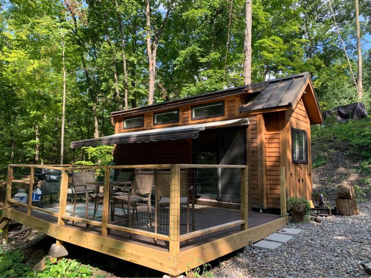 Spacious deck outside the main entrance of Two Bedroom High End Tiny Home 