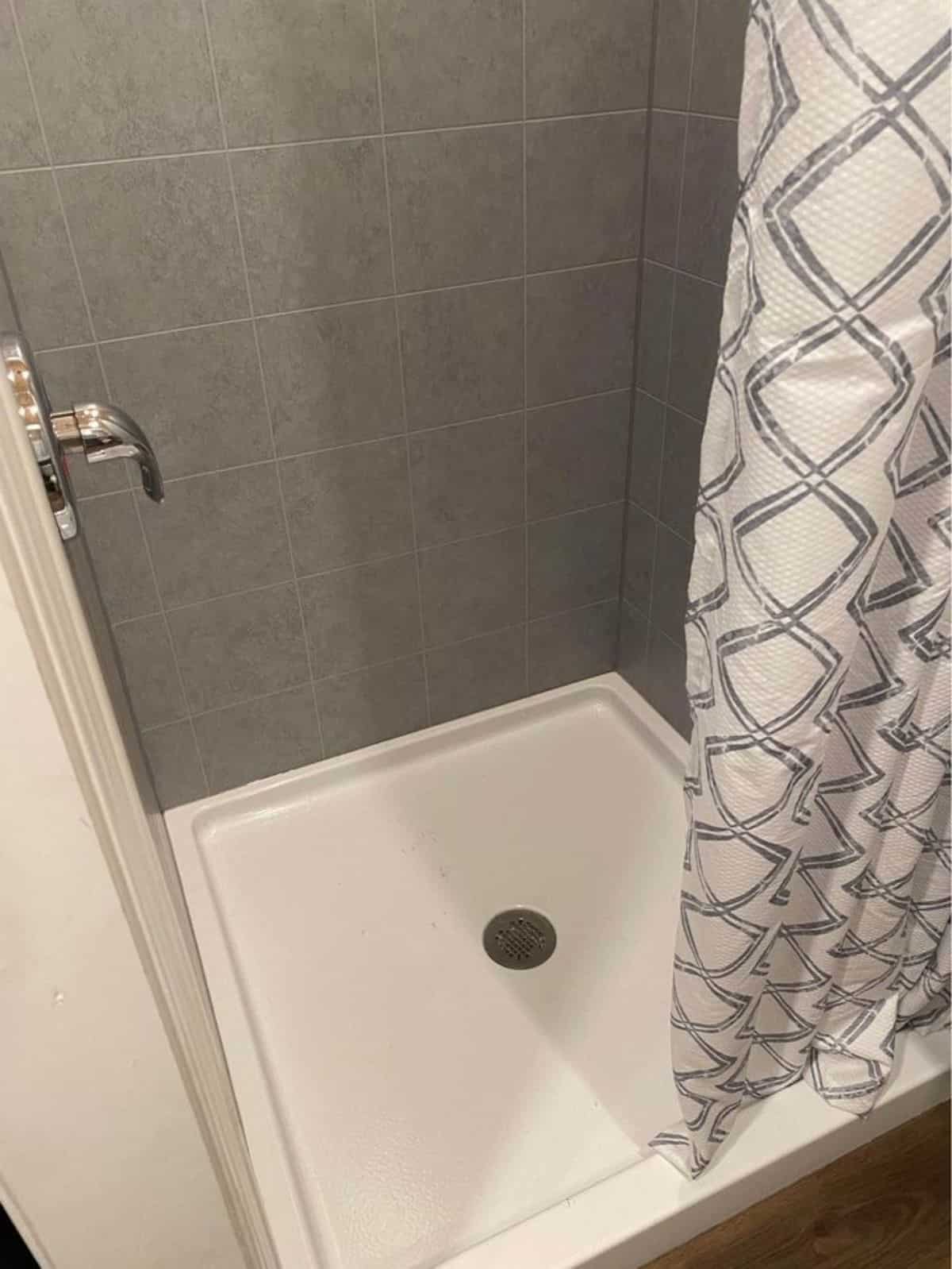 Separate shower area in bathroom of 20' Budget Friendly Tiny House