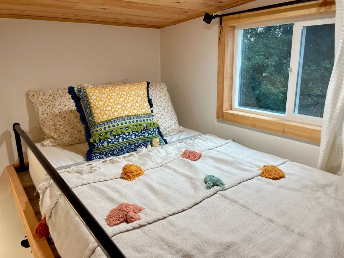 Loft bedroom is also comfortable and stylish and has a window for some fresh air