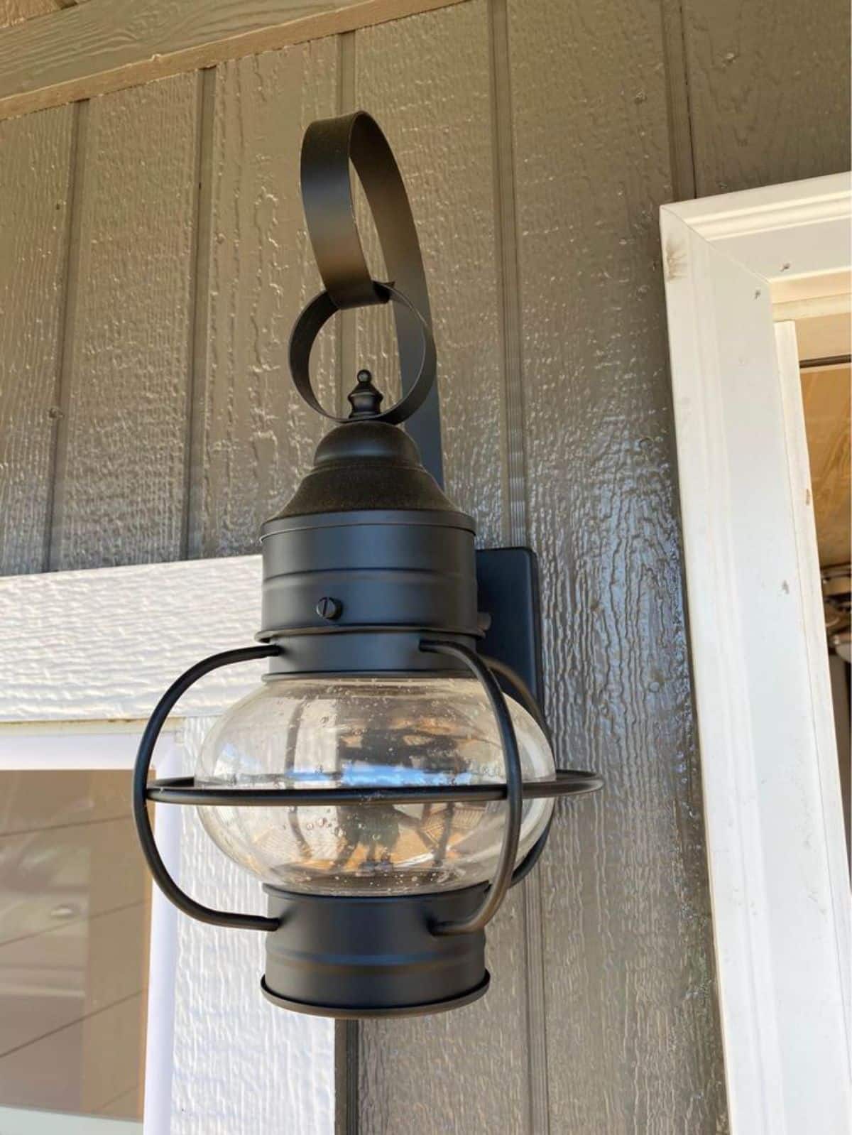 Stunning porch light on the porch makes it even more beautiful during night