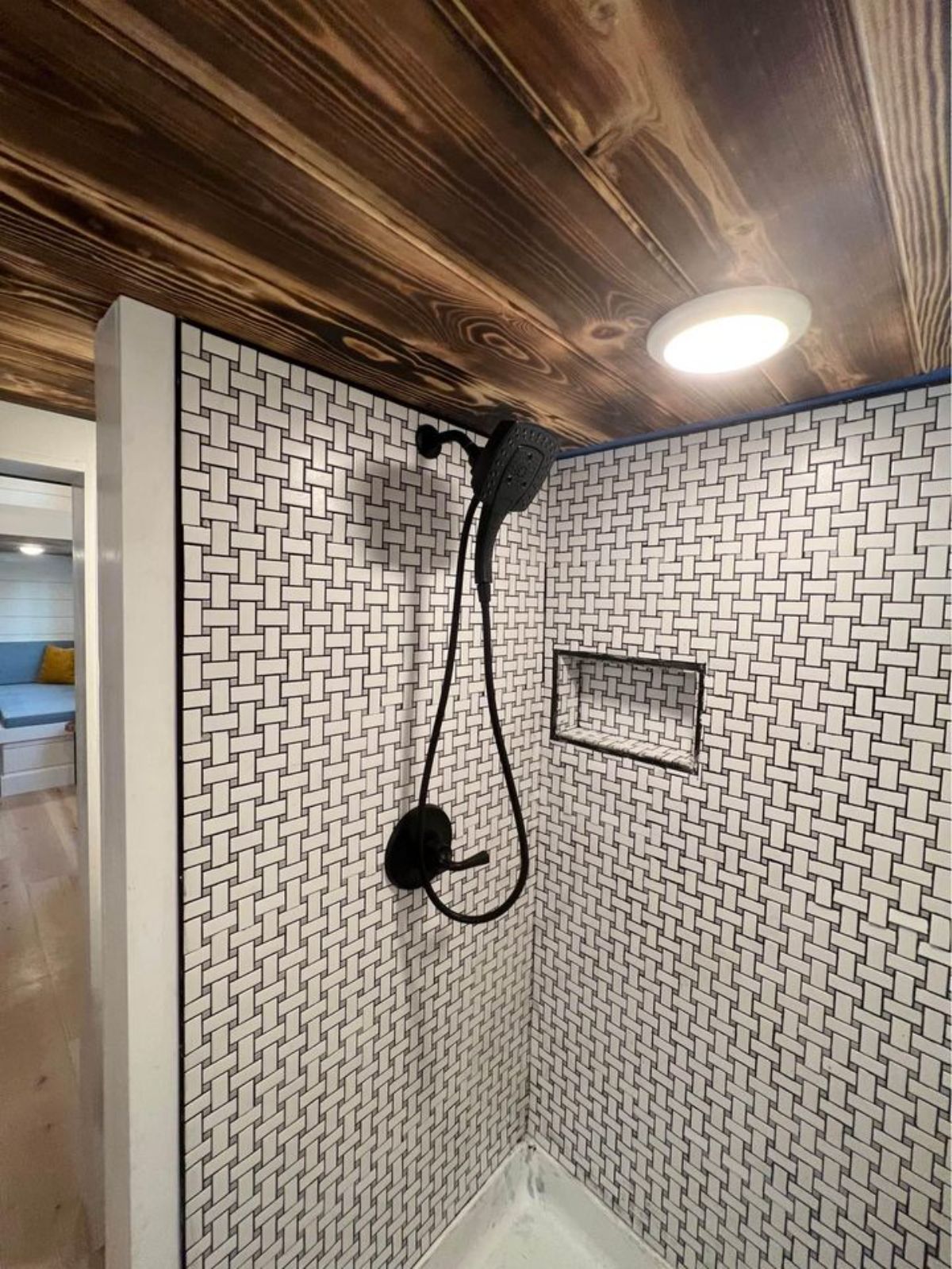 Stylish shower area at 24’ Tiny House With Dual Lofts