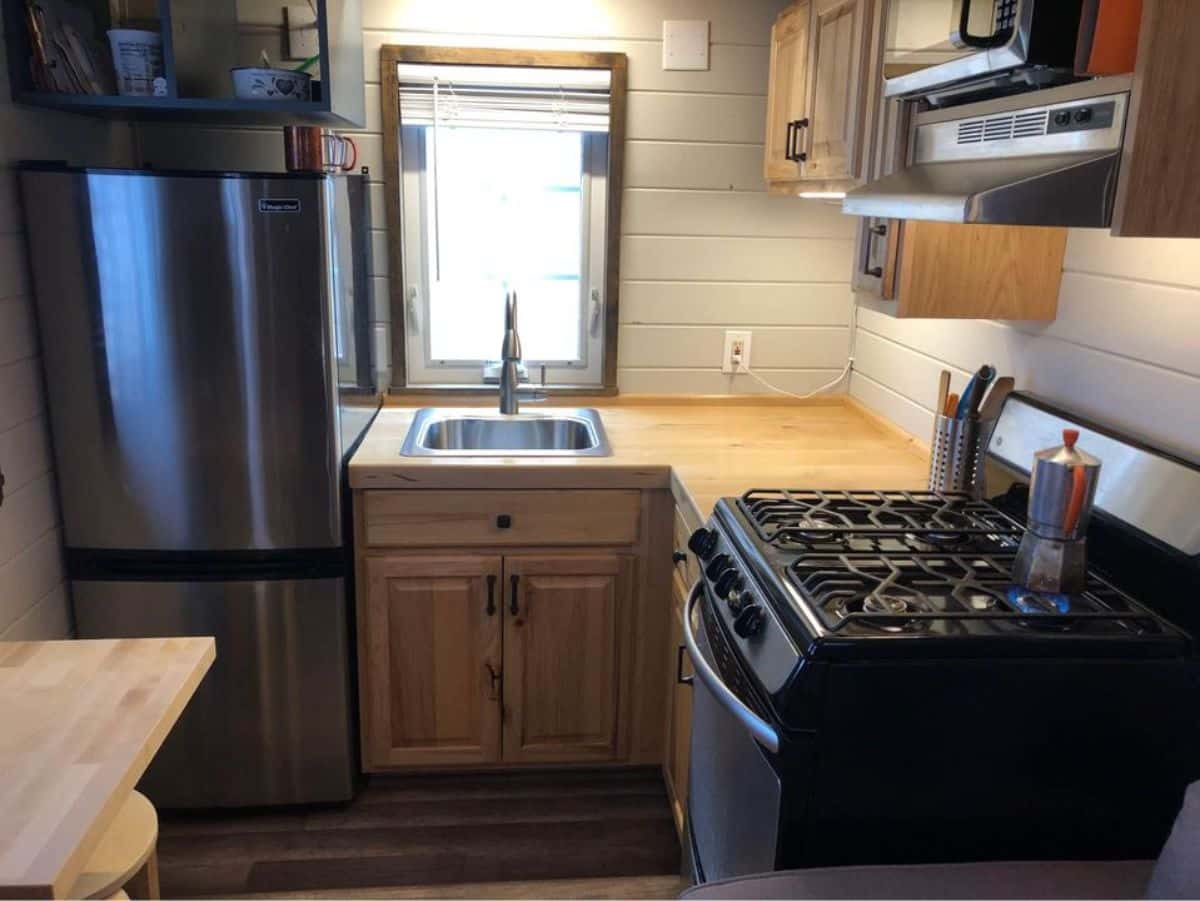 Small and compact kitchen area of 24' Tumbleweed Tiny House
