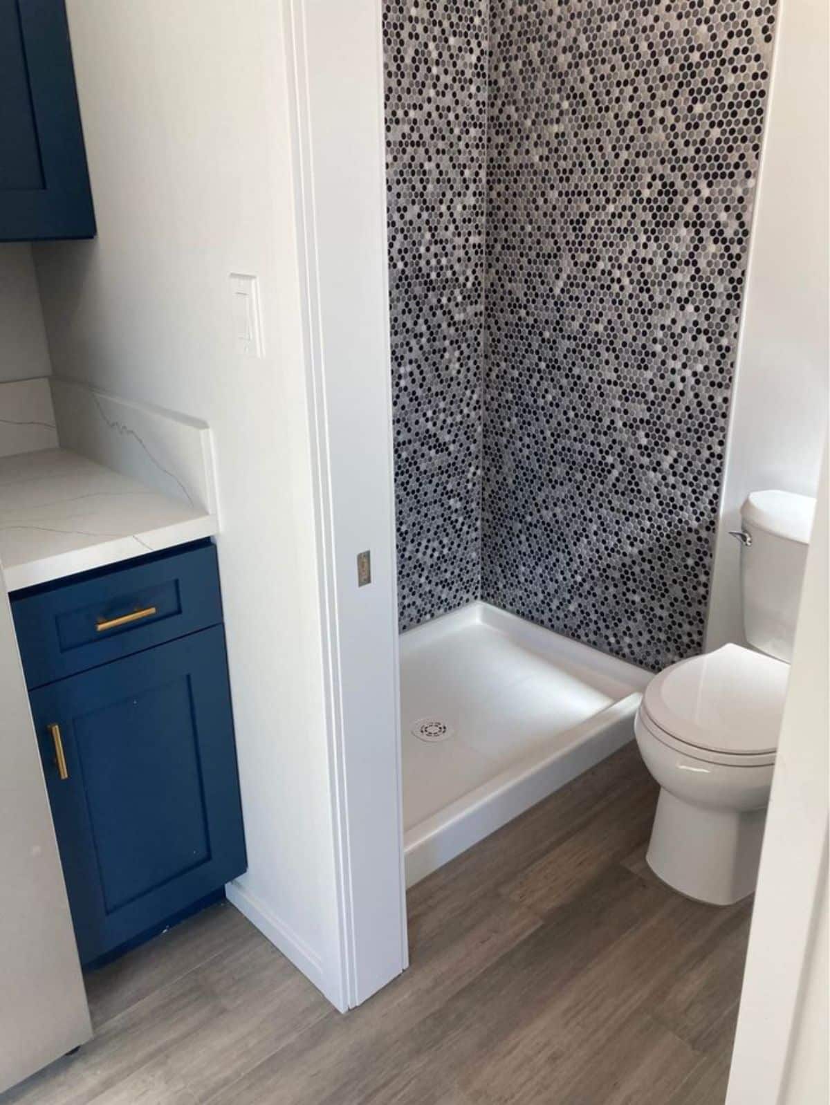 Standard toilet is installed in 30' Durable Tiny Home