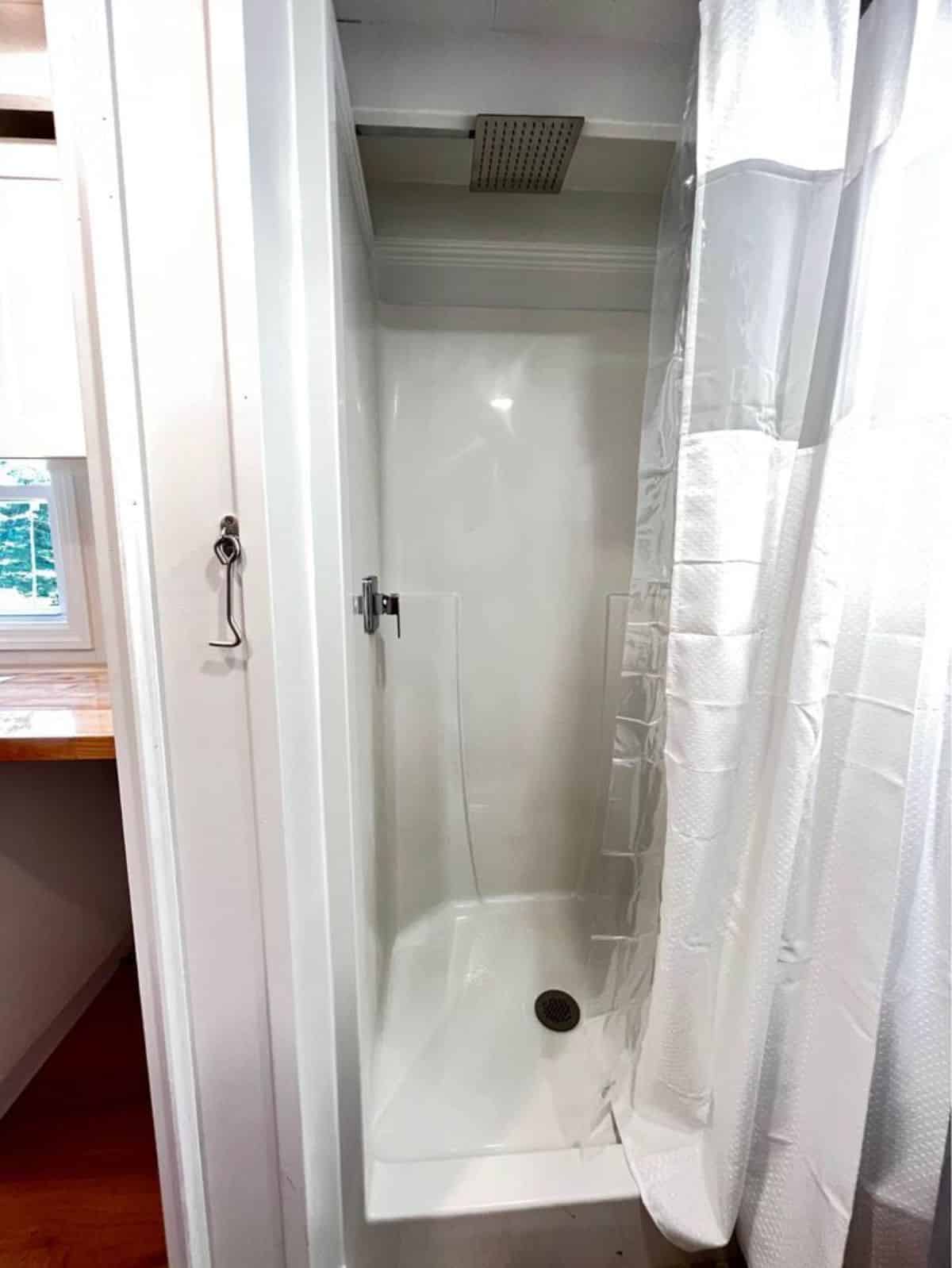 Separate shower area of Aesthetic Tiny Home