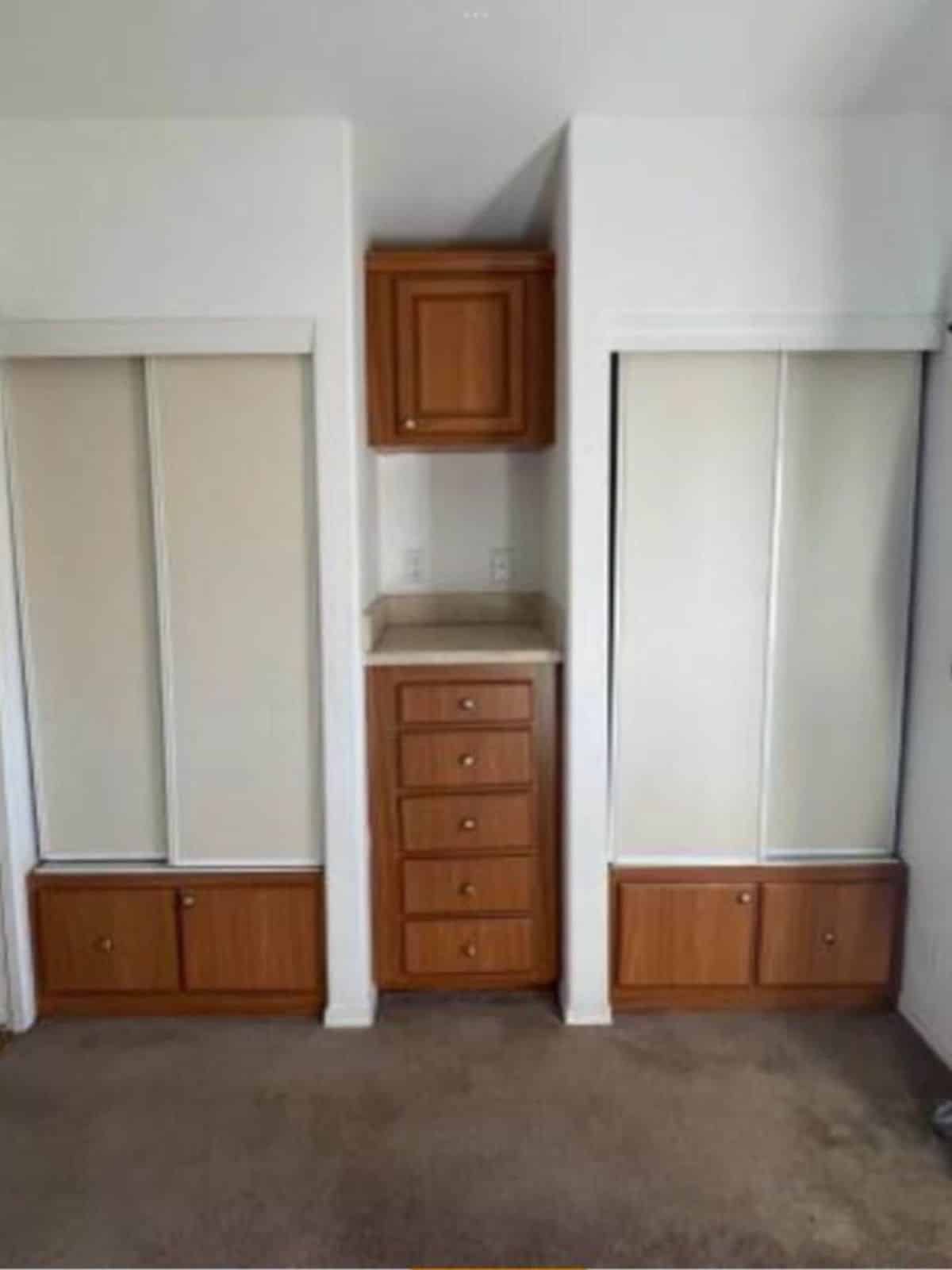 Wardrobe and storage cabinets in bedroom