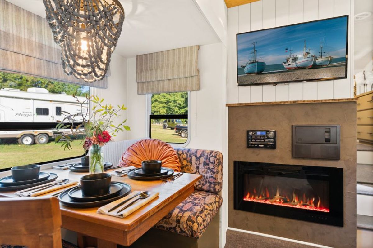 An electric fire place is also installed in order to make the trailer warmer during cold days and wall mounted TV set
