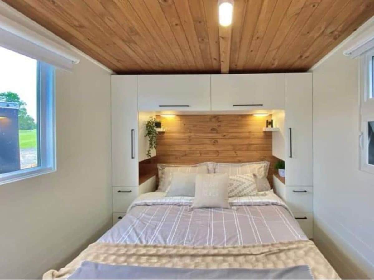Super comfortable bed in bedroom of Minimalistic tiny house
