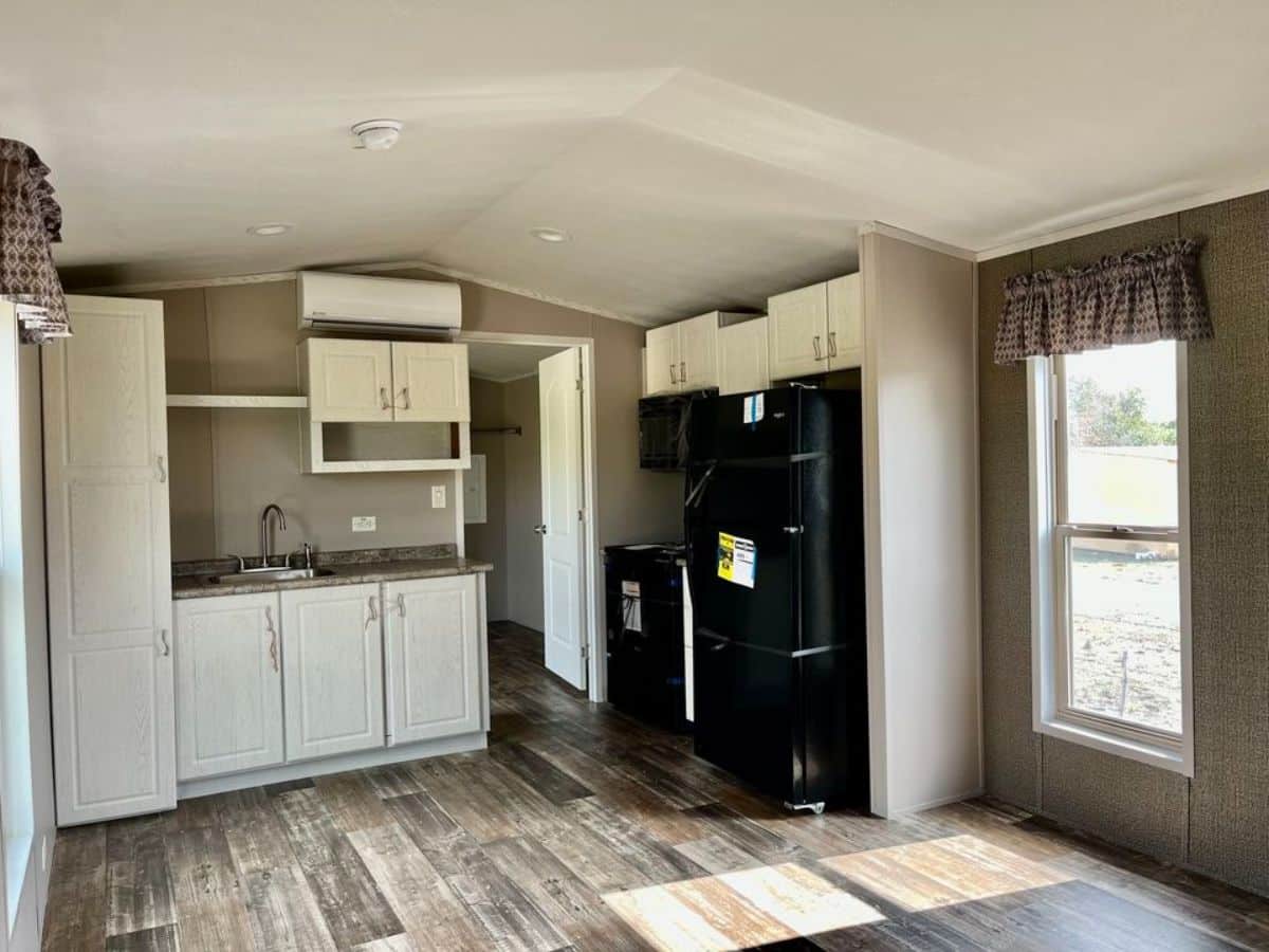 Well organized kitchen area of 1 Bedroom Tiny House Comes