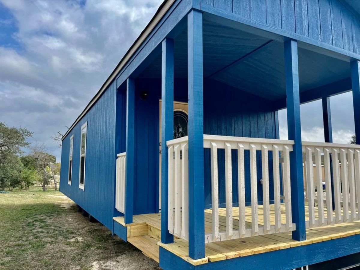Stunning blue exterior of 1 Bedroom Tiny House Comes