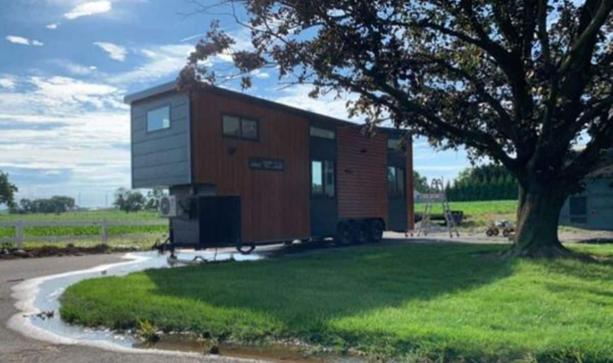 Backside with huge windows of 26' Tiny Mobile Home