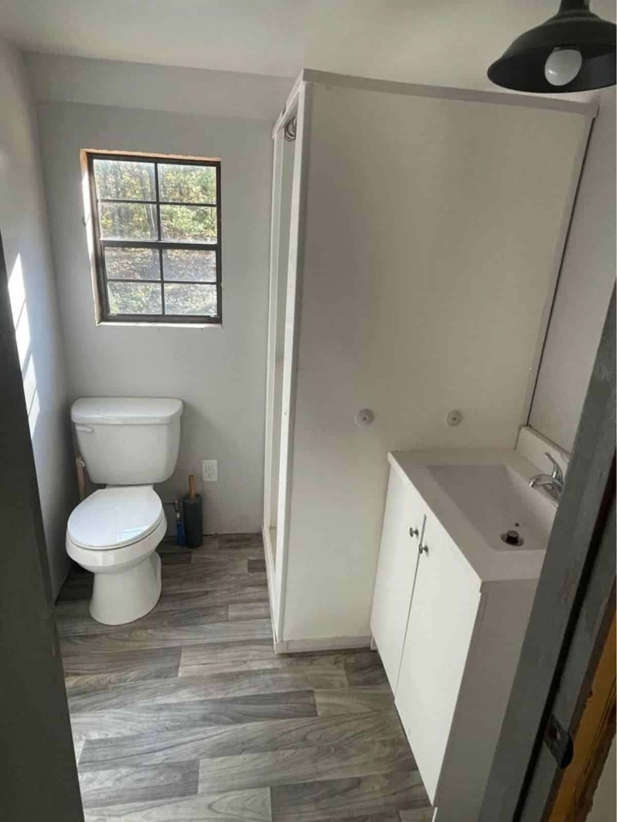 Bathroom of 28' Amish Tiny House with all the necessary fittings