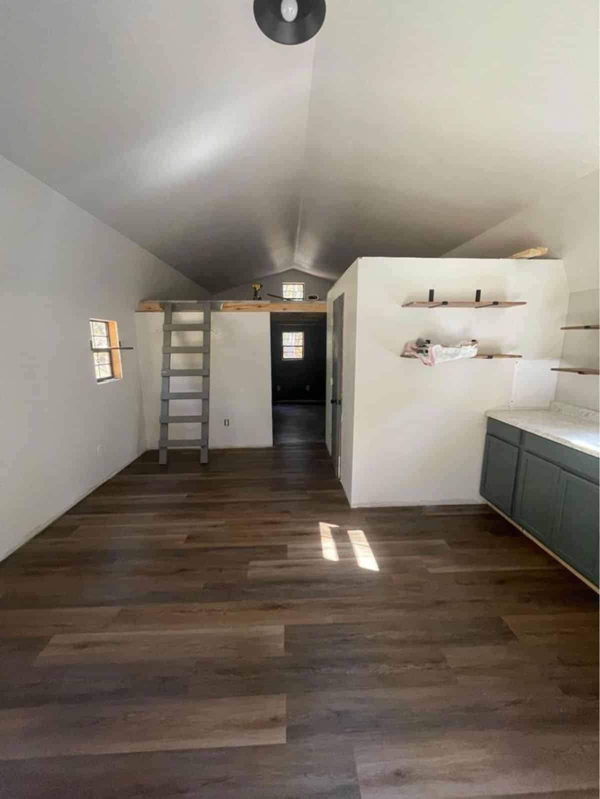 Long open space of 28' Amish Tiny House Can Be a Cabin can be utilized to decorate a stunning living area
