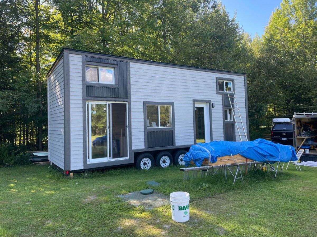 White and grey exterior of 28' Tiny Mobile House