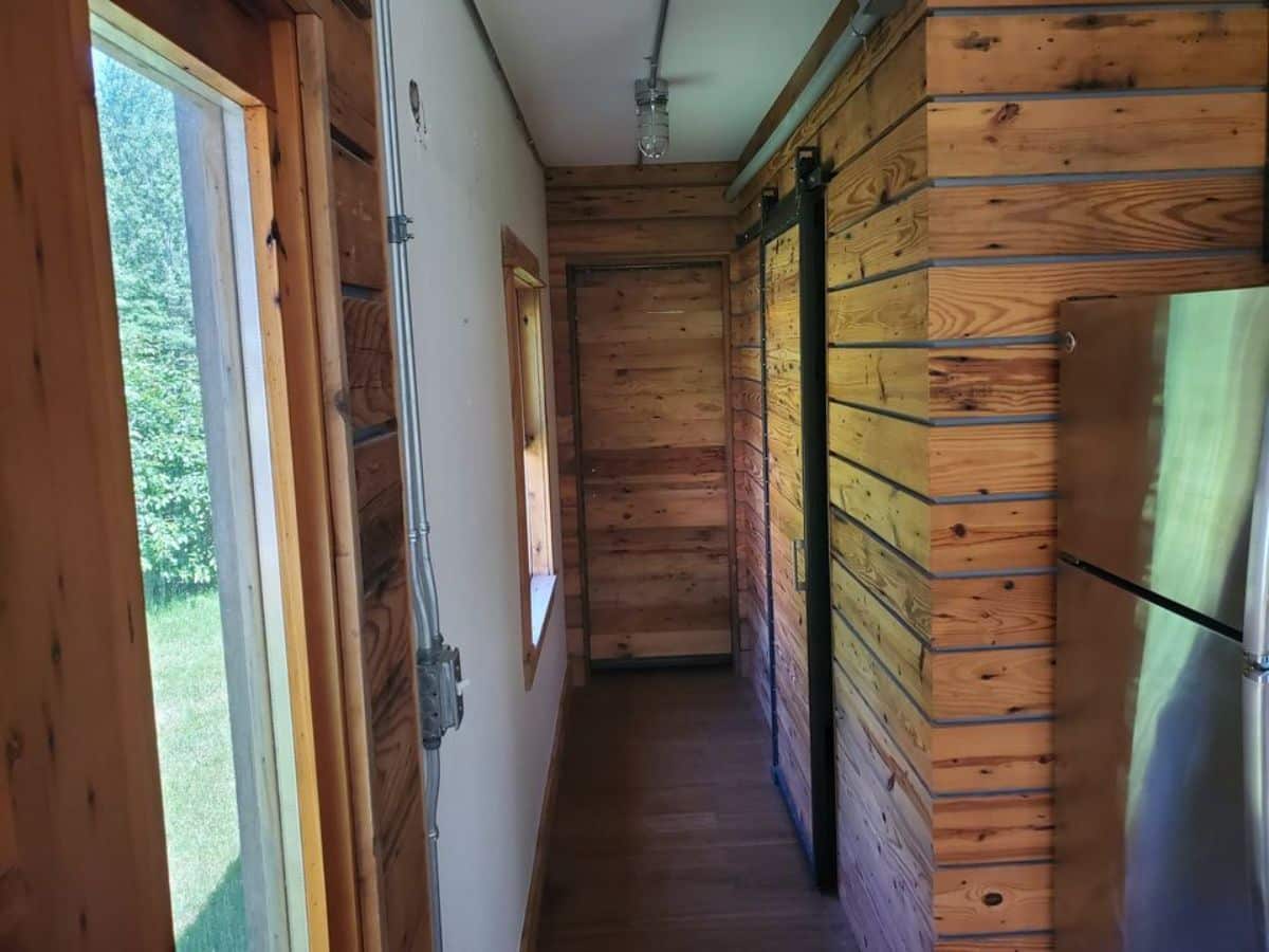 Insulated Wooden walls and flooring of 40' Luxury Shipping Container Tiny Home