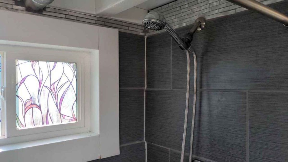 Shower area in bathroom of 2 Bedroom Tiny House