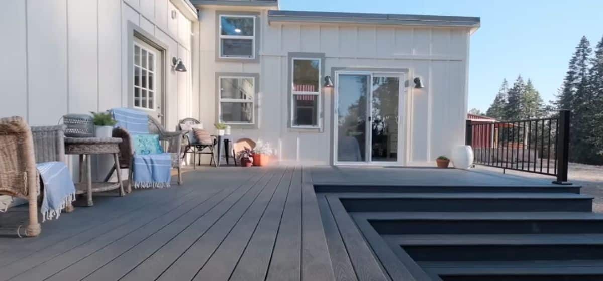 gray wood porch and deck on tiny home