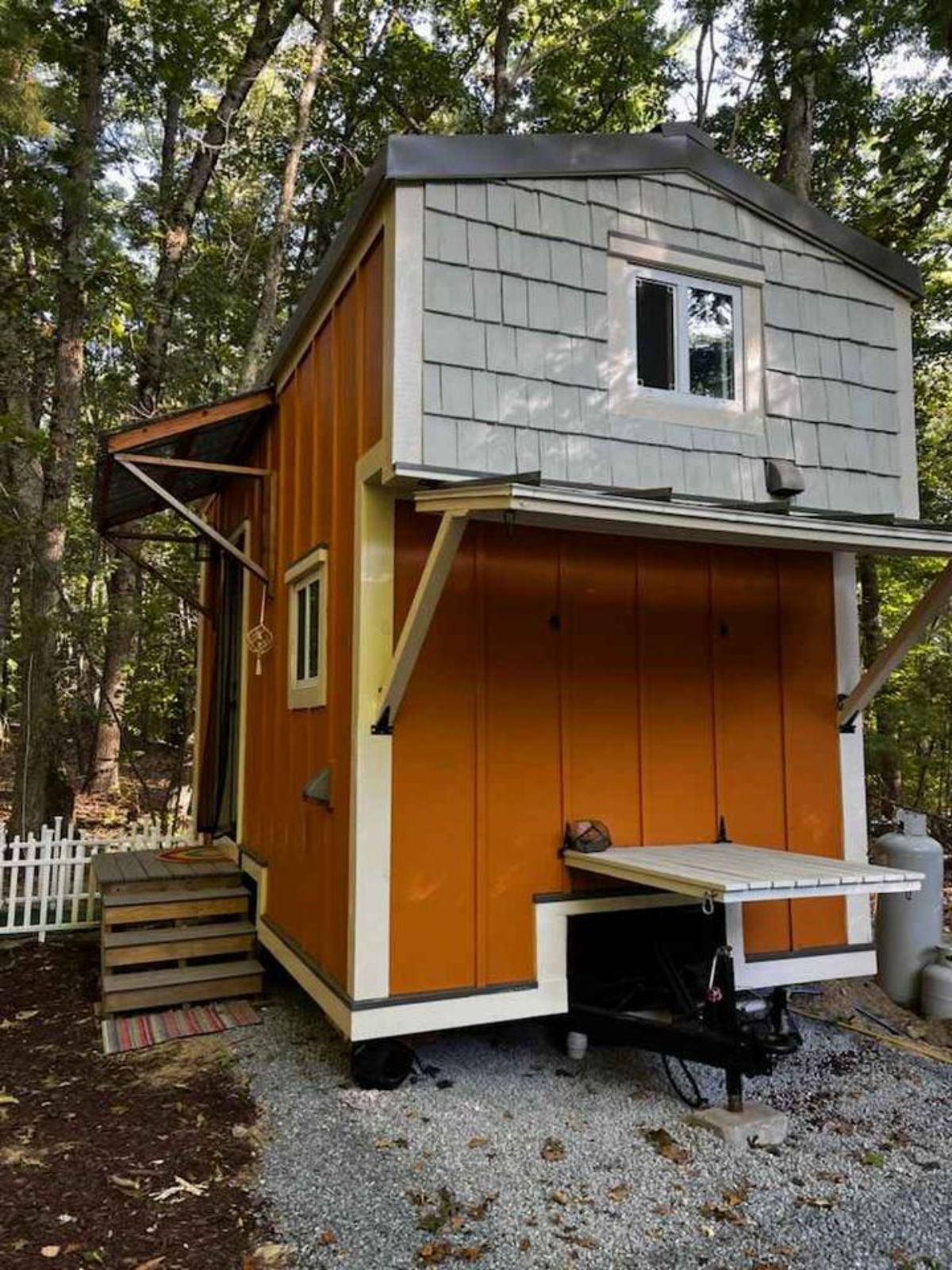 Stunning exterior of 20' two bedroom tiny house from backside