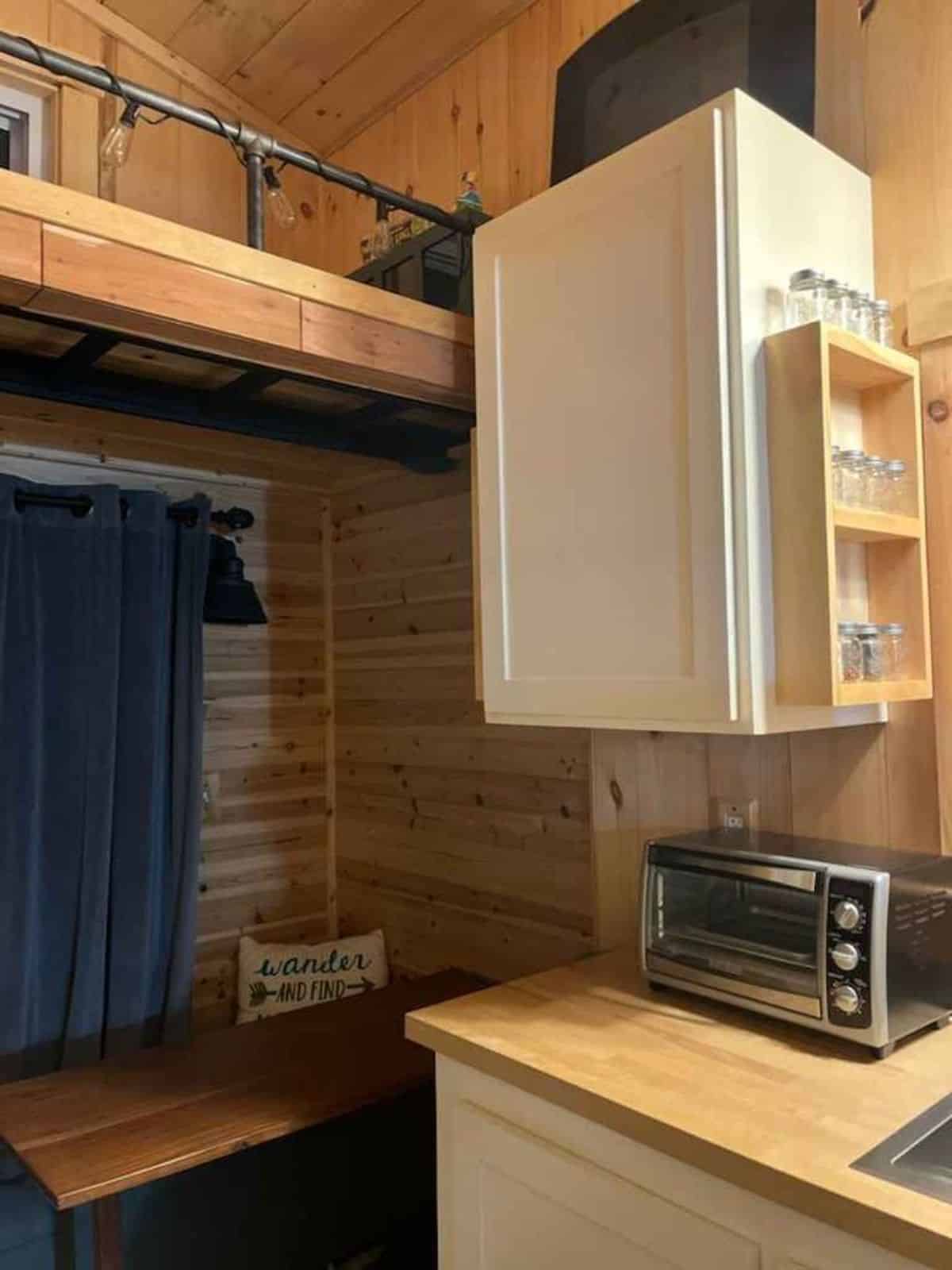 Essential appliances in the kitchen area of 20' Two Bedroom Tiny House
