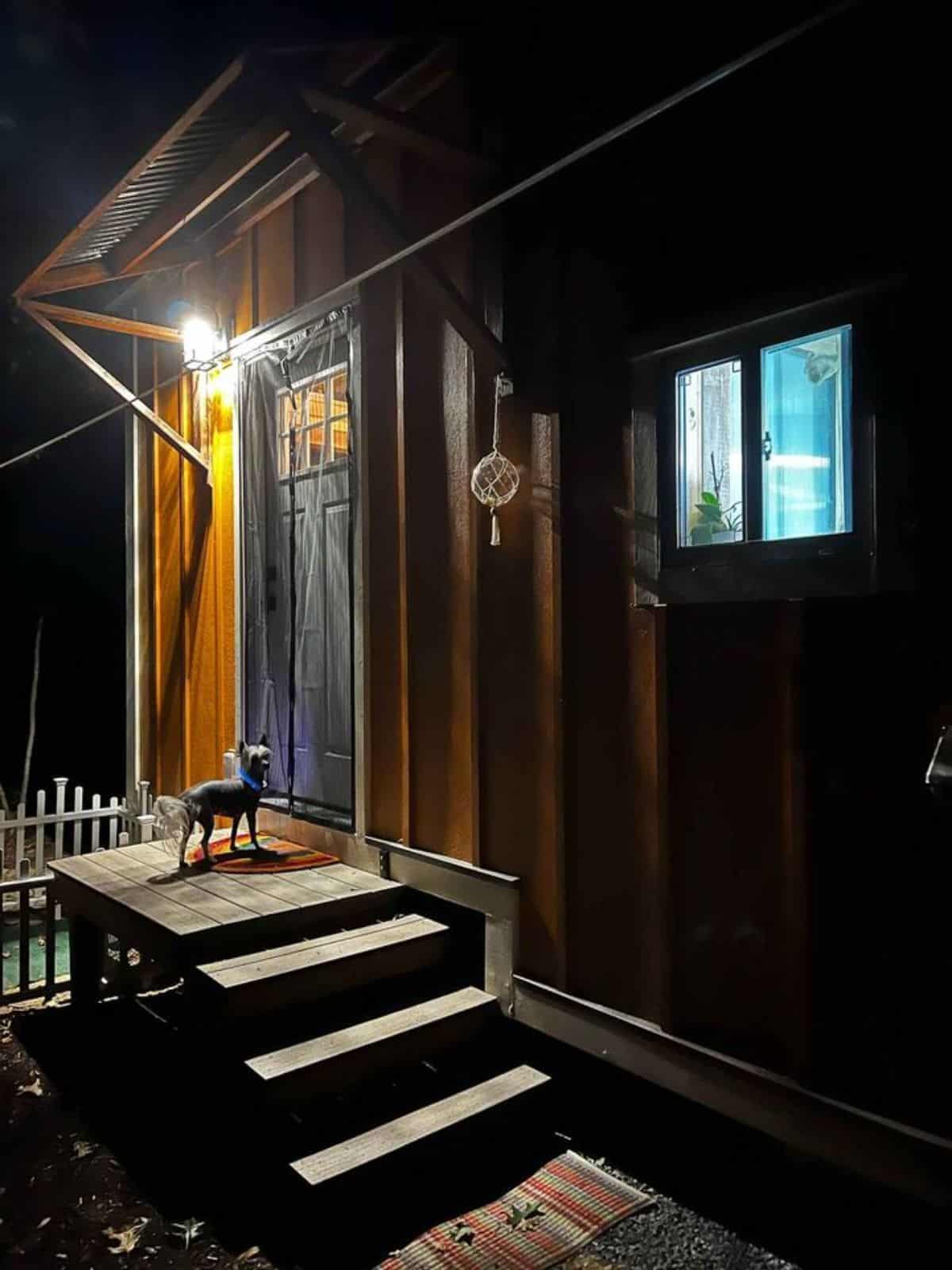 Small porch outside the main door of 20' Two Bedroom Tiny House
