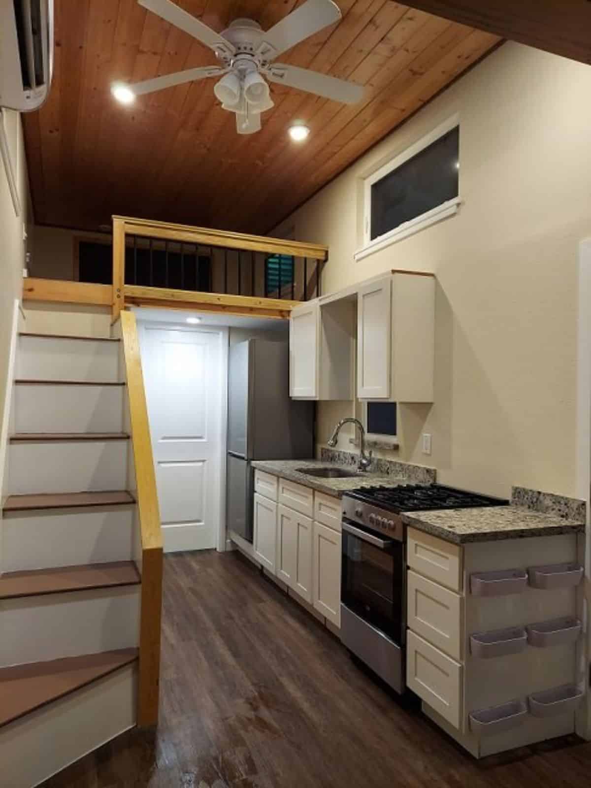 Kitchen area of 24’ tiny house on wheels