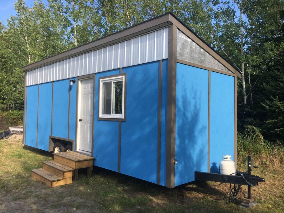 Stunning blue exterior of 25' Tiny House