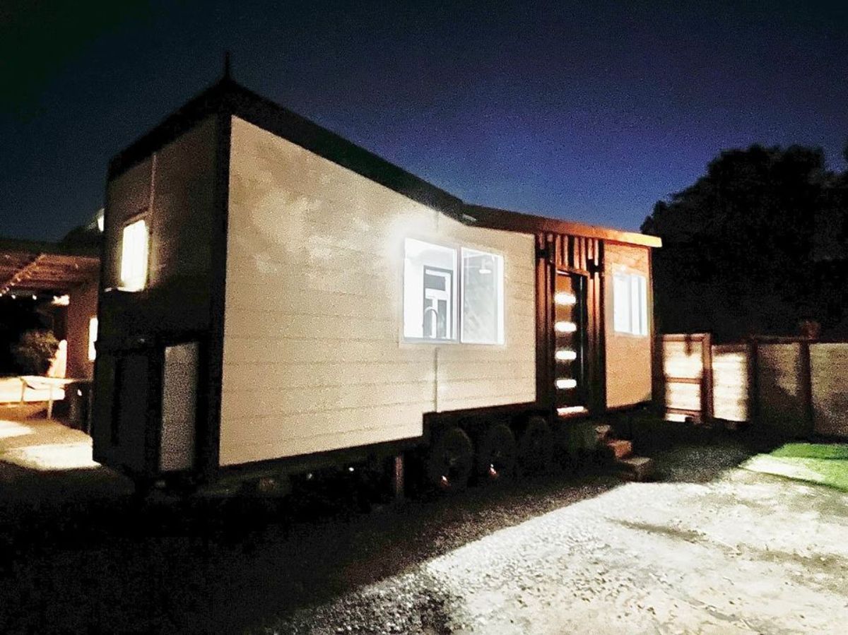 28’ park model tiny home at night