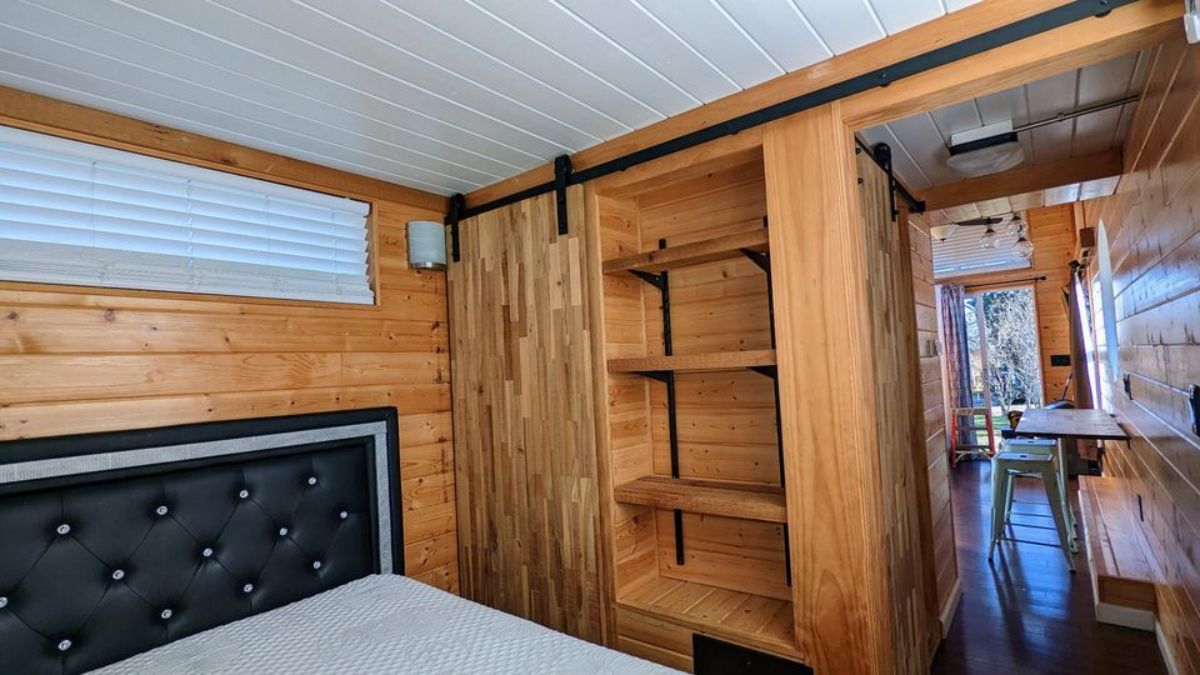Bedroom of 28' Tiny House is very well organized