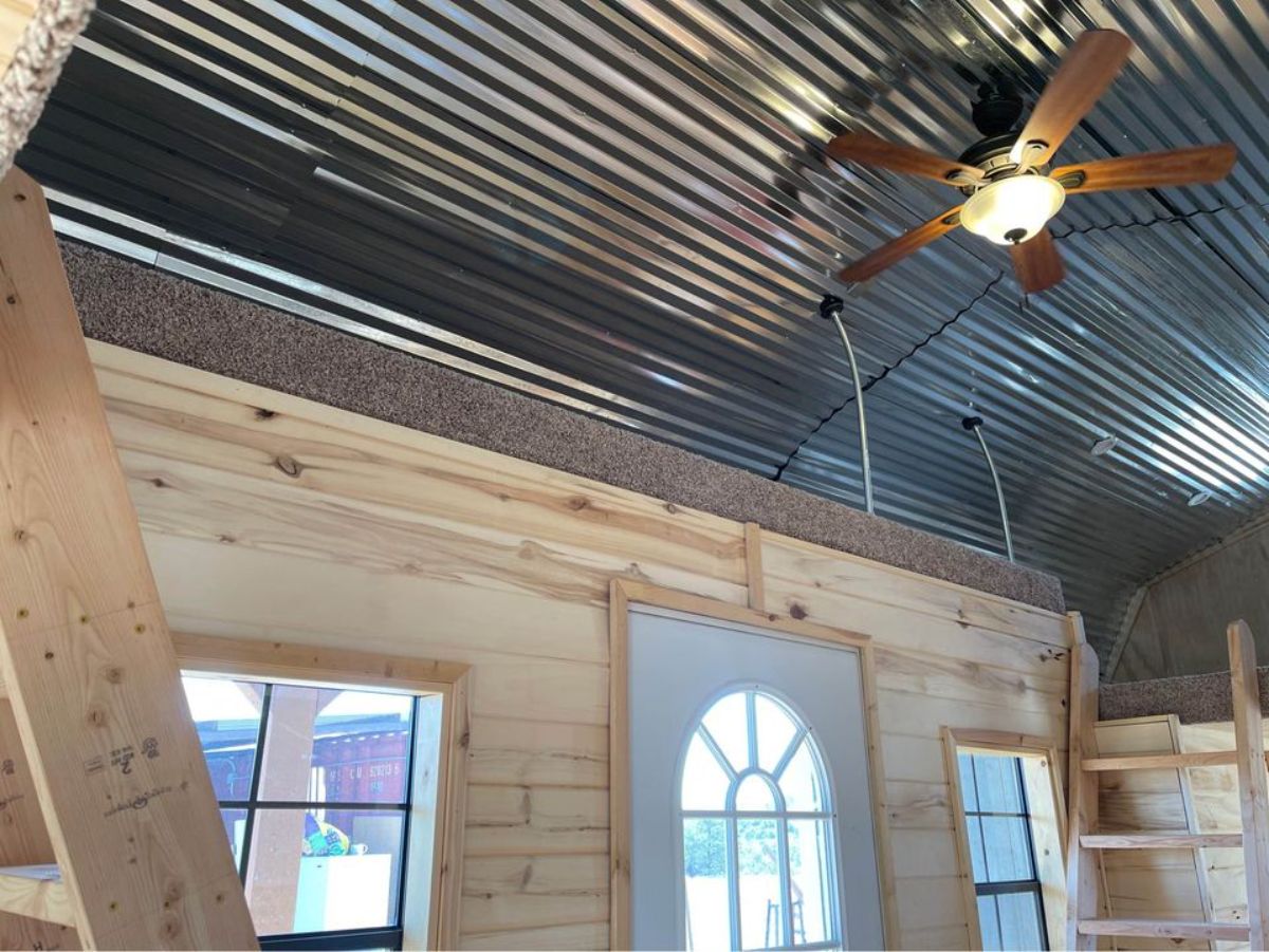 Huge ceiling with fan of 30' tiny cabin house
