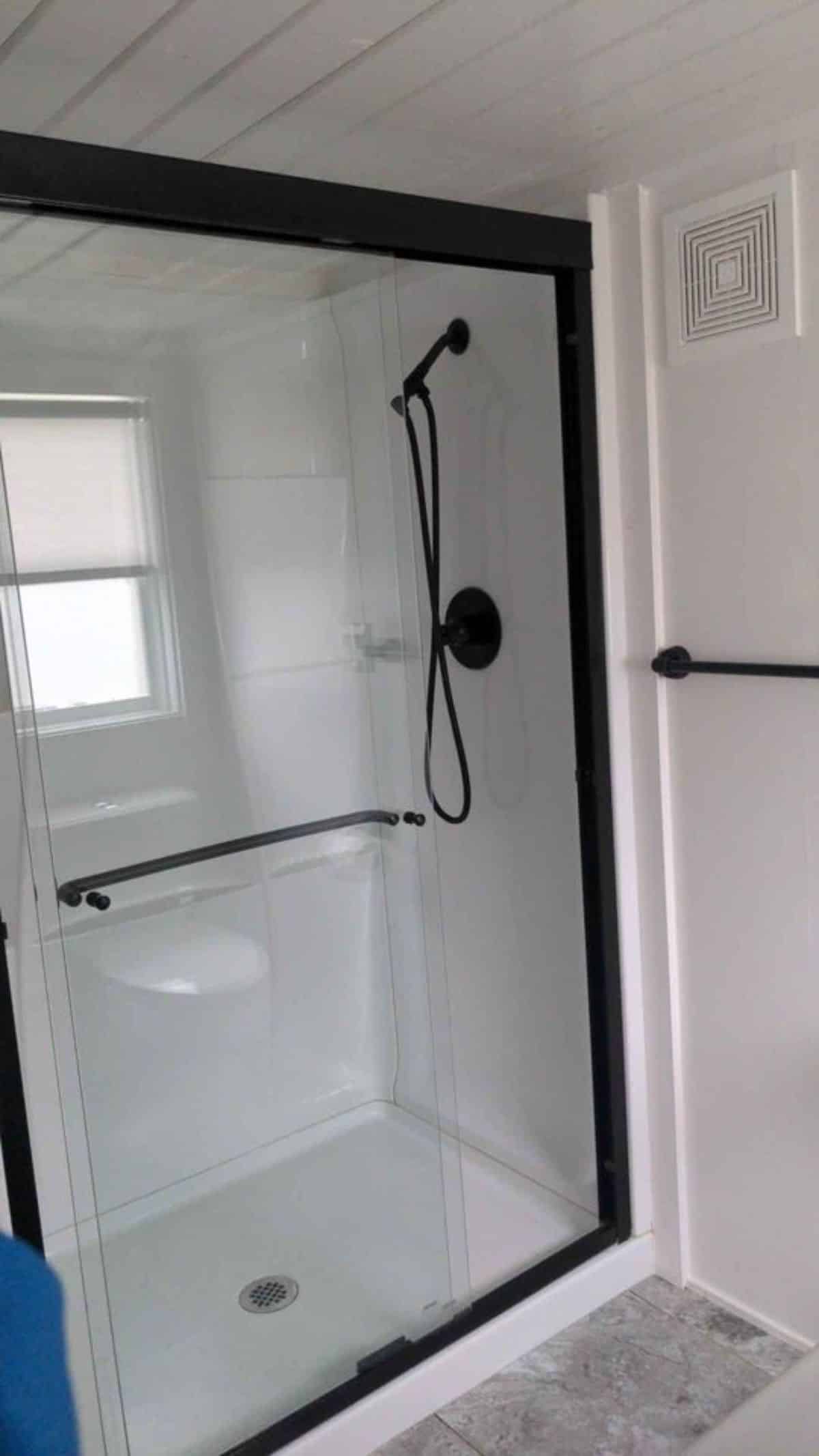 Separate shower area in bathroom of 30' Tiny Cabin is Fully Furnished,