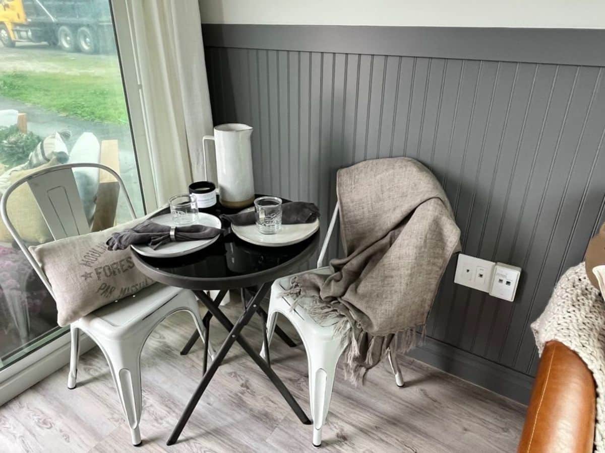 Separate dining area with table and chairs