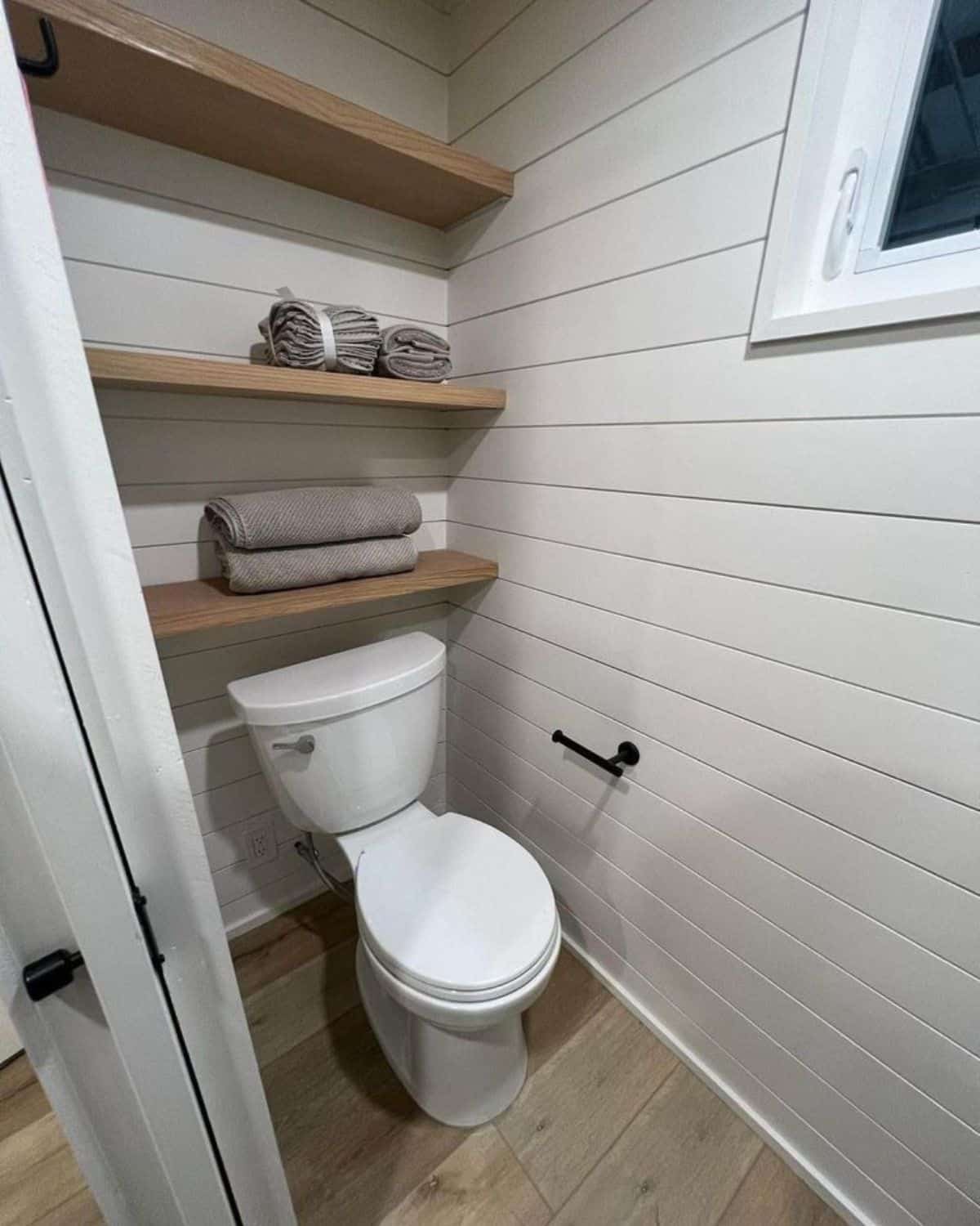 Standard toilet of perfect tiny room on wheels
