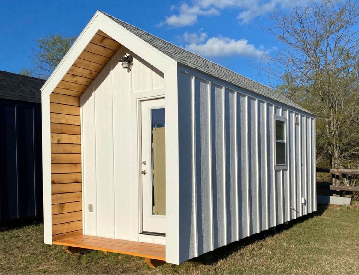 Front view of stunning white exterior of Affordable Tiny Home