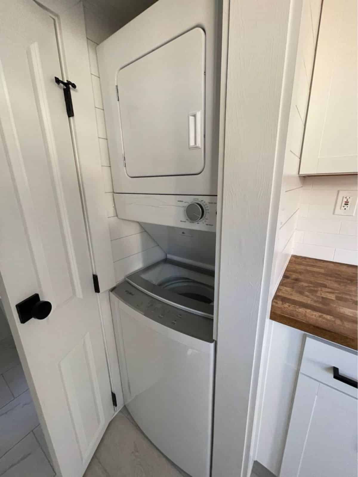 Washer dryer combo is also included in Certified Tiny House on Wheels