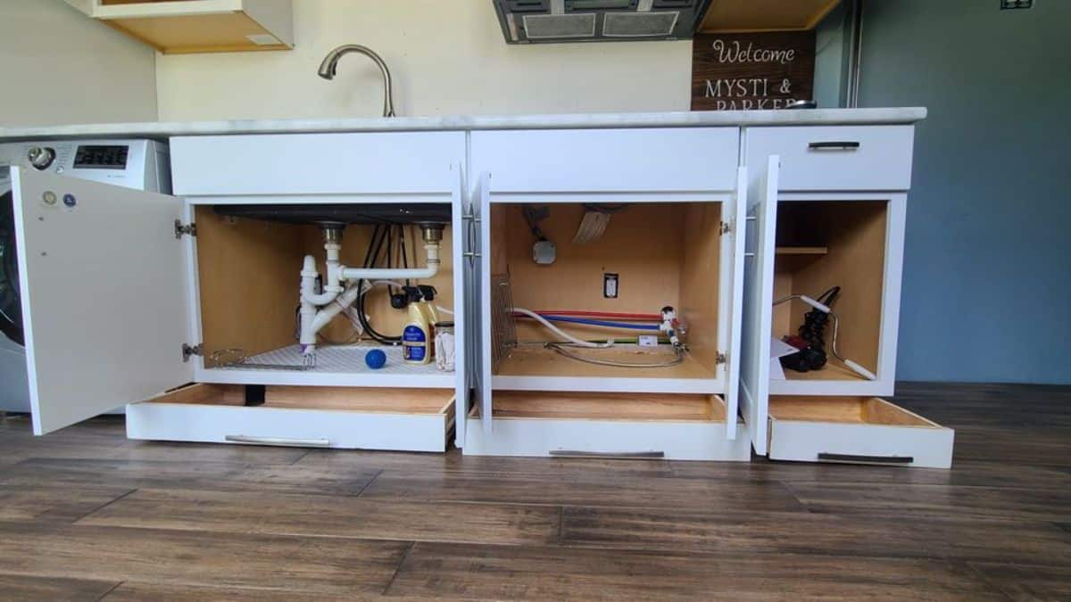open cabinets below kitchen counter