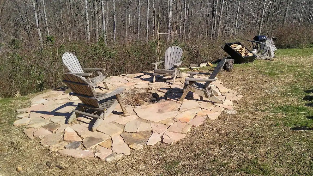 fire pit with adirondack chairs