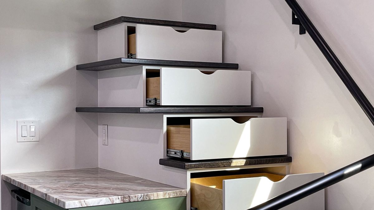 storage drawers under steps to loft
