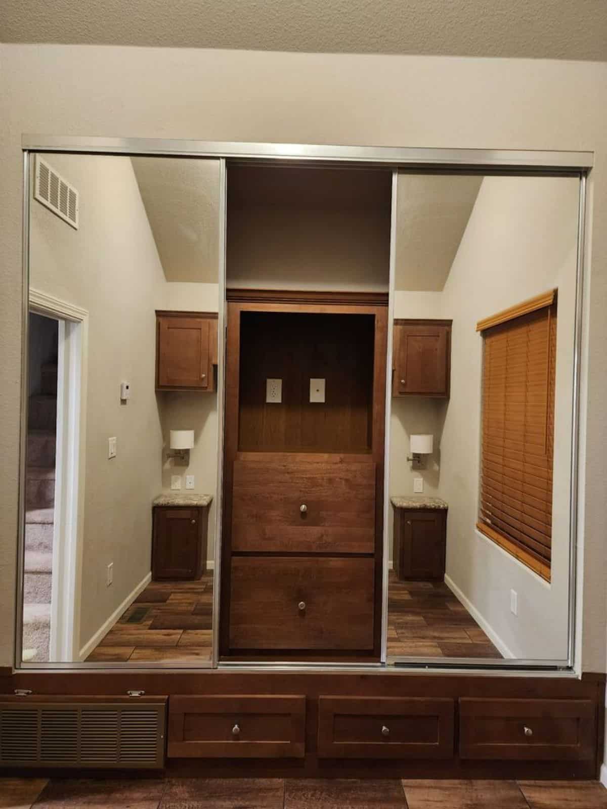 Full length mirror wardrobe in bedroom of Spacious Tiny House